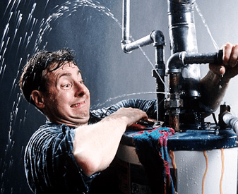 A man struggles to fix a leaking water pipe, with water spraying out and soaking his clothes. Desperation sets in as he realizes he might need an emergency plumber in Atlanta for professional assistance.