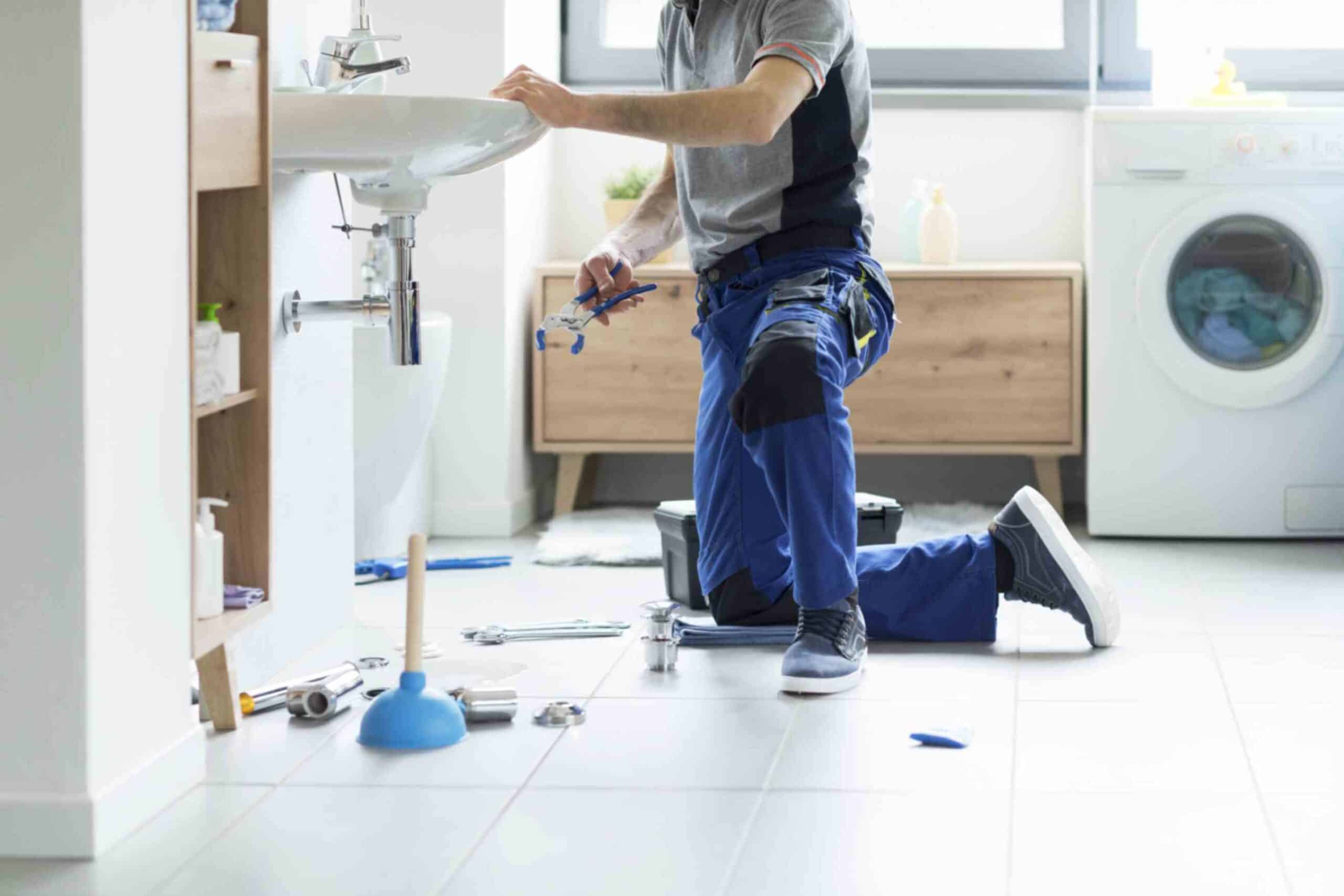 professional plumbing service plumber-fixing bathroom